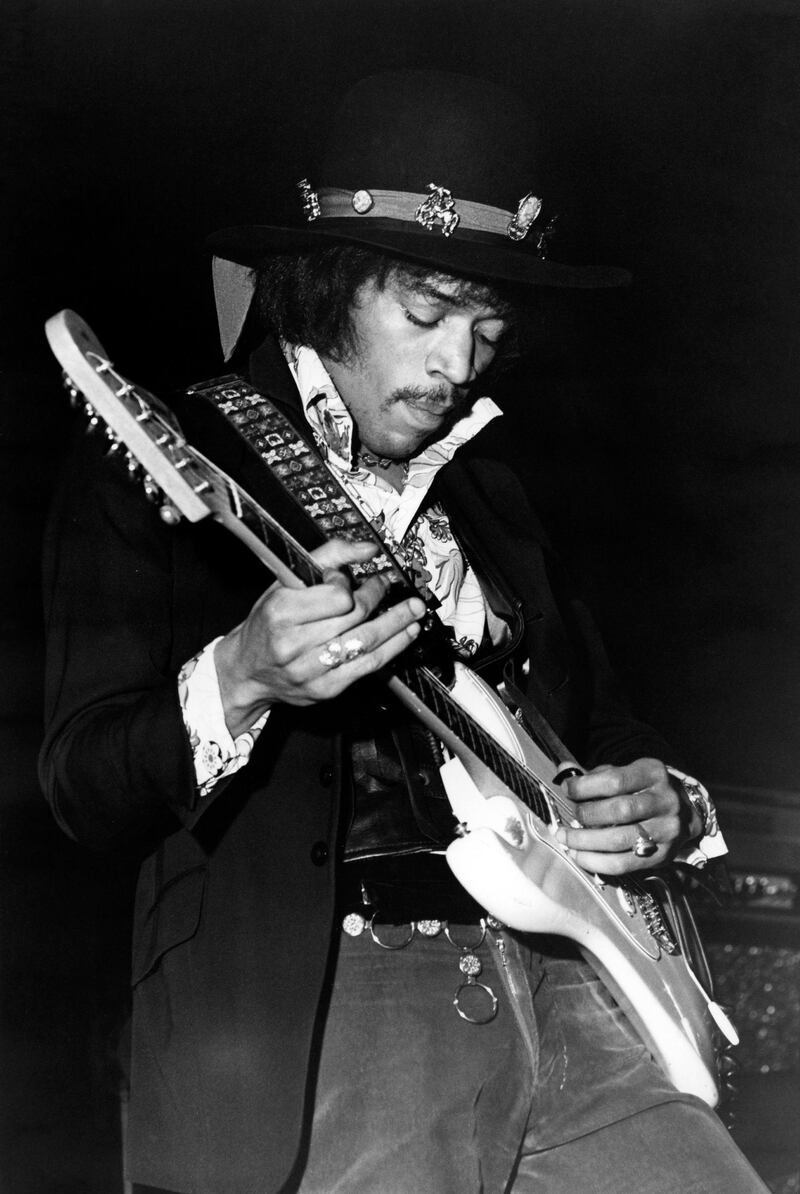UNITED KINGDOM - JANUARY 01:  Photo of Jimi HENDRIX and JIMI HENDRIX EXPERIENCE; Jimi Hendrix performing on stage, playing white Fender Stratocaster guitar  (Photo by Val Wilmer/Redferns)