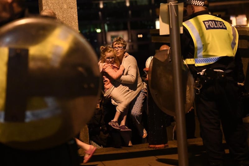 People are led to safety on Southwark Bridge away from London Bridge after an attack on June 4, 2017 in London, England. Carl Court / Getty Images