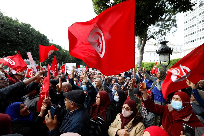 Demonstrators were marching against Tunisia's President Kais Saied a week before elections to a new parliament created by his constitutional changes. Reuters