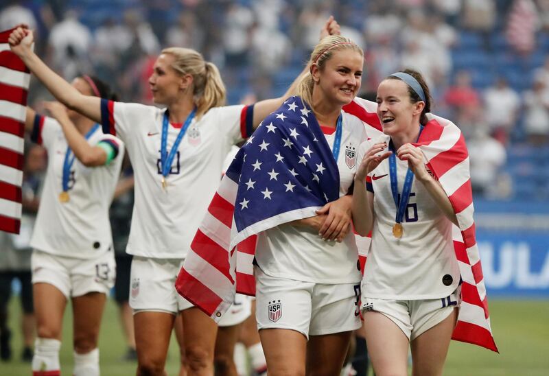 Lindsey Horan and Rose Lavelle celebrate their success. Reuters