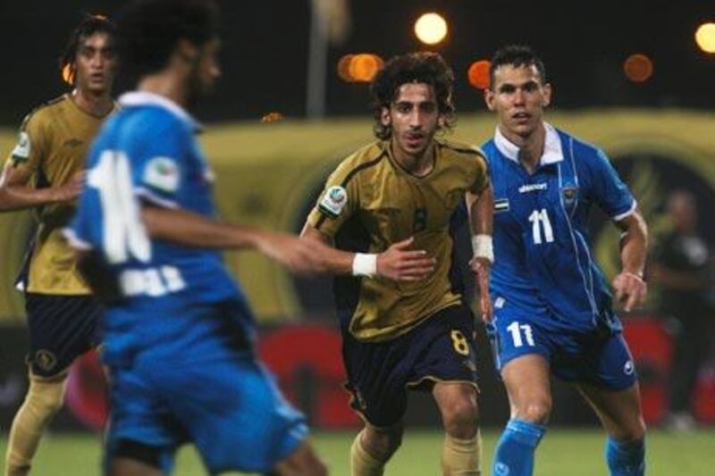 Dibba, in blue, held Dubai to a goalles draw.