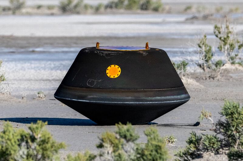 The return capsule containing a sample collected from the asteroid Bennu in October 2020 by NASA’s OSIRIS-REx spacecraft is seen shortly after touching down in the desert at the Department of Defense's Utah Test and Training Range in Dugway, Utah, U. S.  September 24, 2023.   NASA/Keegan Barber/Handout via REUTERS THIS IMAGE HAS BEEN SUPPLIED BY A THIRD PARTY.  MANDATORY CREDIT     TPX IMAGES OF THE DAY