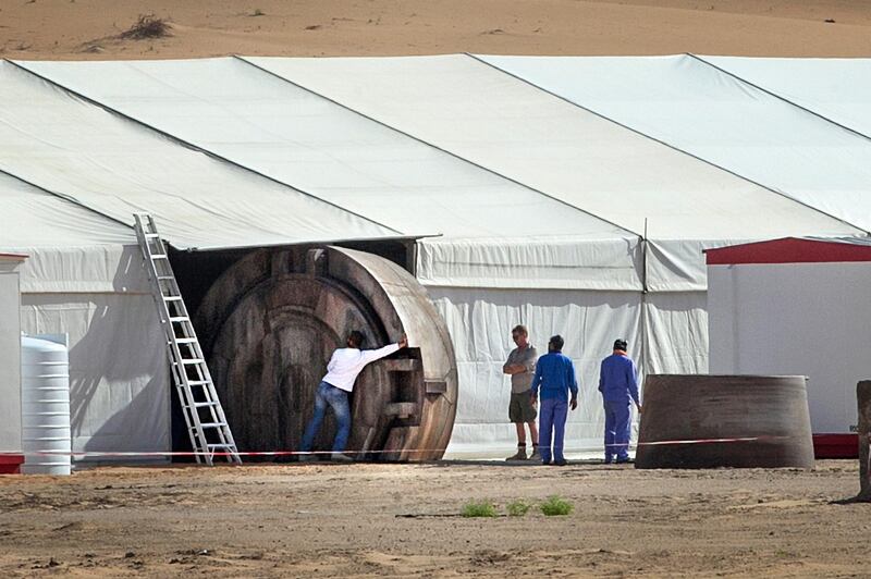 Abu Dhabi, United Arab Emirates. April 15, 2014///

Rolling out the structure for the set. Star Wars crew. Qasr Al Sarab, Abu Dhabi, United Arab Emirates. 
Mona Al-Marzooqi/ The National 

Reporter: Christopher Newbould 
Section: National 
 EXCLUSIVE TO THE NATIONAL / ABU DHABI MEDIA
NO UNAUTHORIZED REPRODUCTION OR REDISTRIBUTION
ALL RIGHTS RESERVED
COPYRIGHT 2014 THE NATIONAL / ABU DHABI MEDIA
 Abu Dhabi, United Arab Emirates. April 15, 2014 This image shows what is believed to be part of a production site filming the next installment of Star Wars in the UAE. Mona Al-Marzooqi / The National 
EXCLUSIVE TO THE NATIONAL / ABU DHABI MEDIA
NO UNAUTHORIZED REPRODUCTION OR REDISTRIBUTION
ALL RIGHTS RESERVED
COPYRIGHT 2014 THE NATIONAL / ABU DHABI MEDIA
