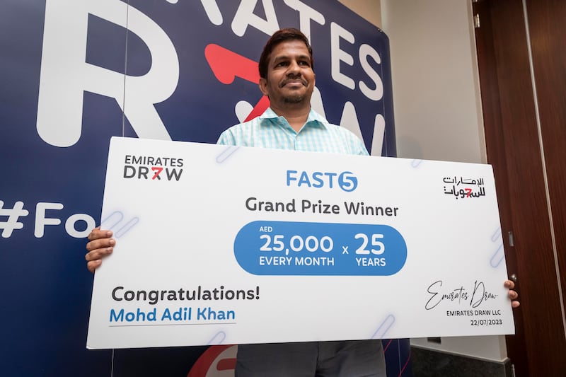Mohammed Adil Khan won a prize with Emirates Draw where he will receive Dh25,000 per month for the next 25 years. Organisers have said they will honour his winnings despite a mandated pause in operations. Antonie Robertson/The National