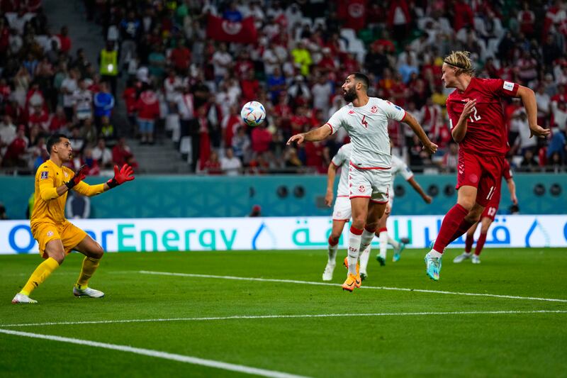 Denmark's Kasper Dolberg heads the ball. AP