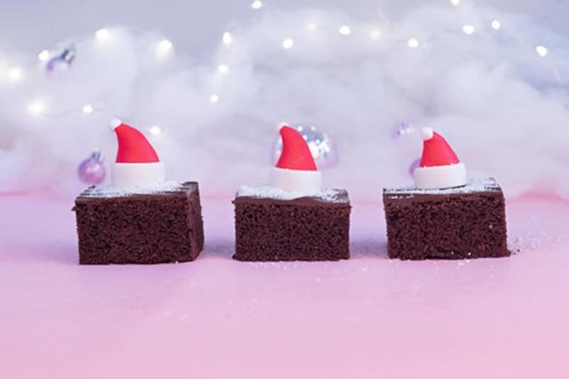 SugarMoo's allergen-free "Crazy Cake" miniature bundle with edible Santa hats. Courtesy of SugarMoo
