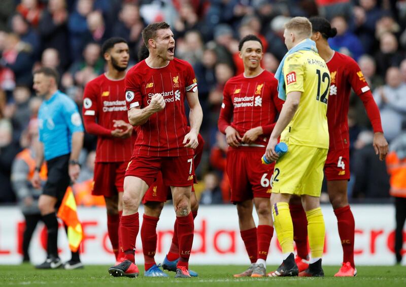 March 7, 2020, Liverpool 2 Bournemouth 1:  James Milner celebrates after a win that takes the club even closer to the Premier League trophy - before the season came to a three-month halt. Reuters