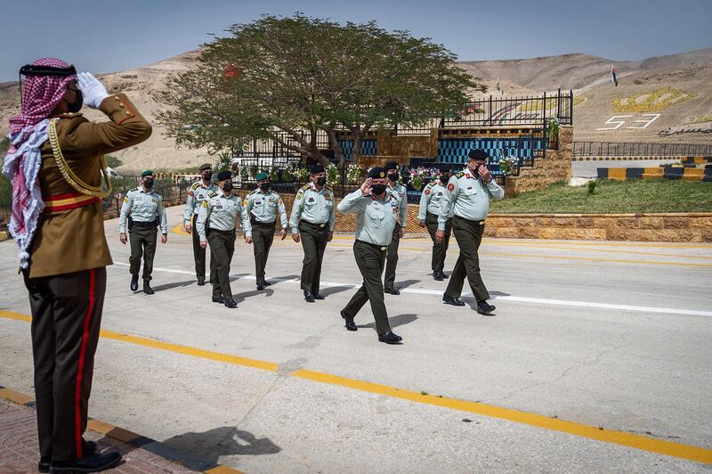 King Abdullah was also accompanied by armed forces chief of staff Major General Yousef Huneiti, right, and other senior military officials. AFP