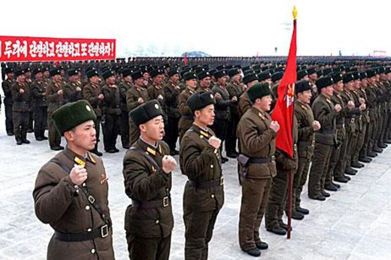 Soldiers of the three services of the Korean People's Army attend a rally to renew allegiance to Kim Jong-un, the supreme commander, and new leader of the country.