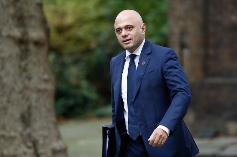 Britain's Home Secretary Sajid Javid arrives to attend the weekly meeting of the cabinet at 10 Downing Street in London on November 6, 2018. / AFP / Tolga AKMEN
