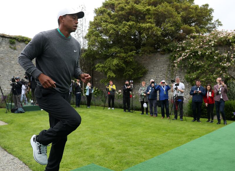 Tiger Woods attends a press conference. Getty Images