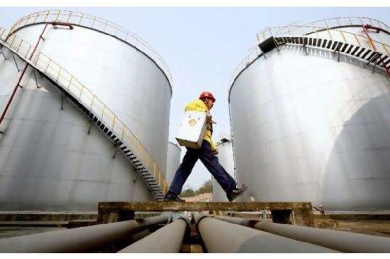 Saudi petrochemical companies reported lower earnings. AP Photo