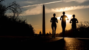 A low-key workout or light jog 90 minutes before sunset means you can reap the benefits of exercising on an empty stomach and replenish yourself with water soon after. AFP
