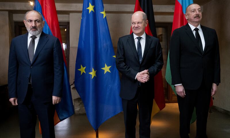 From left, Armenian Prime Minister Nikol Pashinyan, Mr Scholz and Mr Aliyev. Reuters