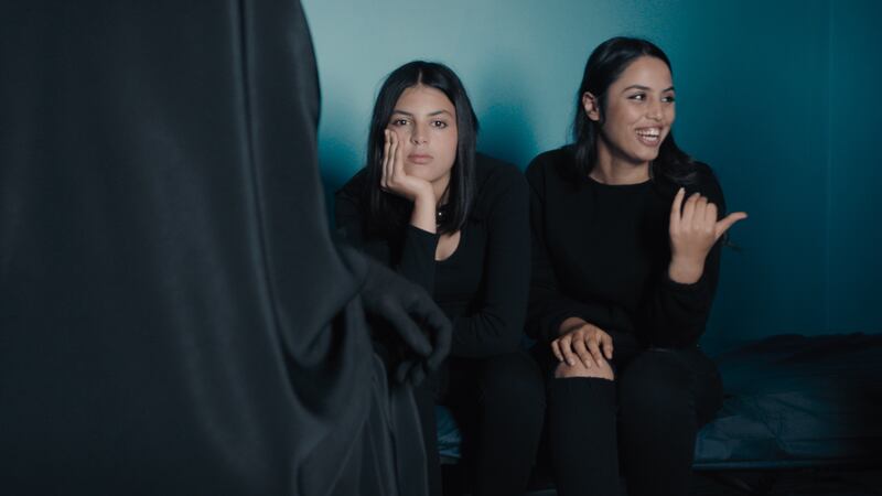 Tayssir Chikhaoui, left, and Eya Chikhaoui portray themselves in Four Daughters, which explores why their two older sisters left home to join ISIS. Photo: Tanit Films