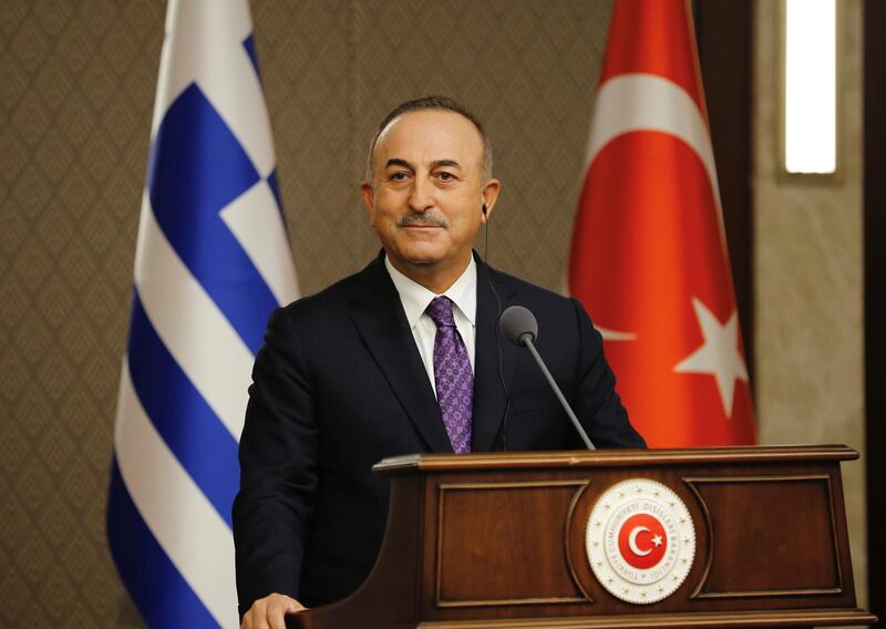 Turkish Foreign Minister Mevlut Cavusoglu looks on during a news conference with his Greek counterpart Nikos Dendias (not pictured) in Ankara, Turkey April 15, 2021. Turkish Foreign Ministry/Handout via REUTERS ATTENTION EDITORS - THIS PICTURE WAS PROVIDED BY A THIRD PARTY. NO RESALES. NO ARCHIVE.