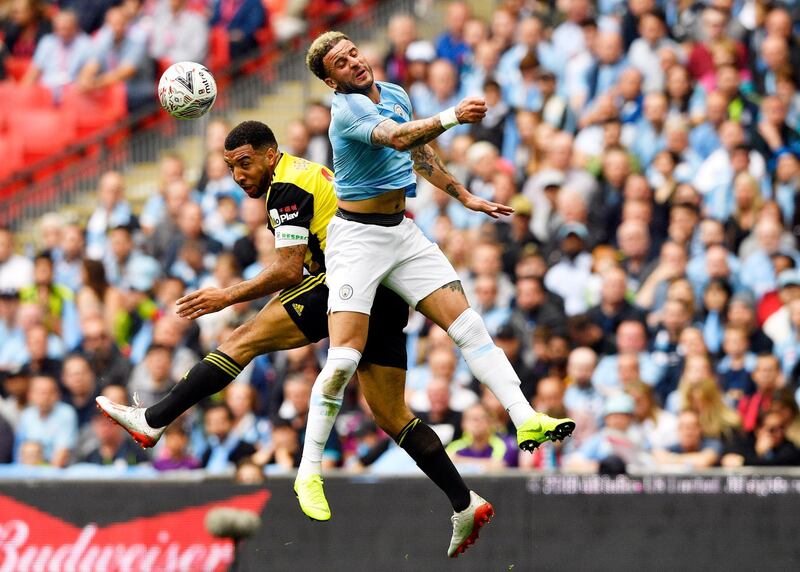 Kyle Walker, right, of Manchester City in action against Troy Deeney of Watford. EPA