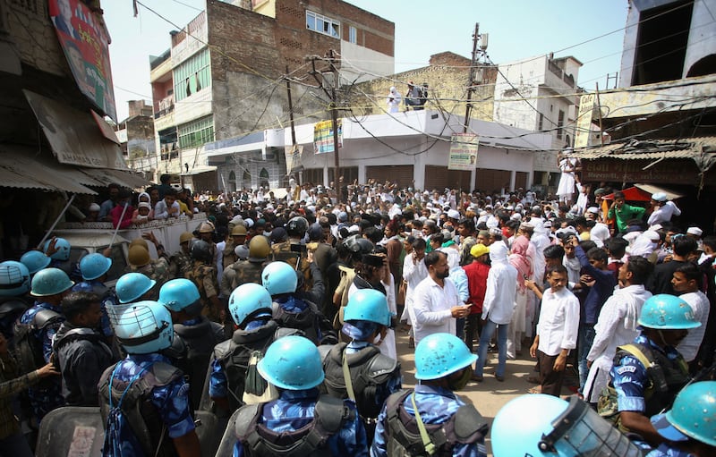 Protesters face off against police during a protest in Prayagraj. Reuters