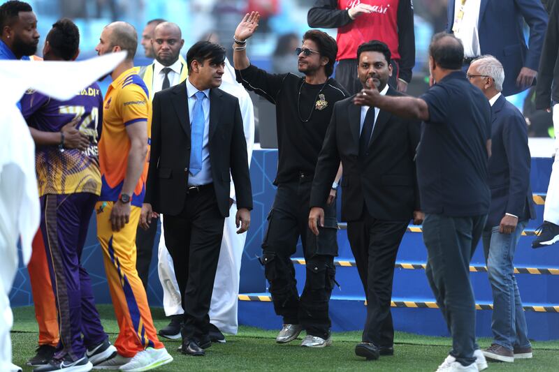 Shah Rukh Khan waves to the crowd in Dubai. Getty