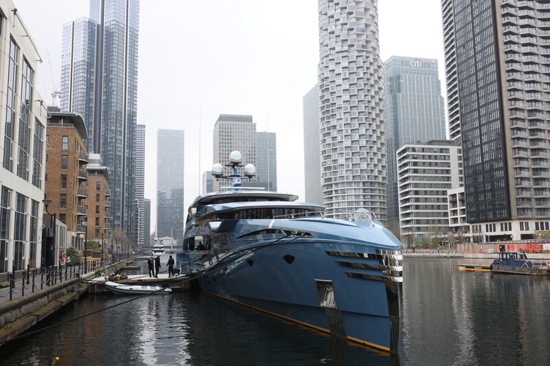 The superyacht 'Phi', which was seized by the UK government on Tuesday, docked at Canary Wharf in London. Transport Minister Grant Shapps ordered the £38 million ($50m) to be held as part of UK government sanctions against Russians with links to President Putin. Getty Images