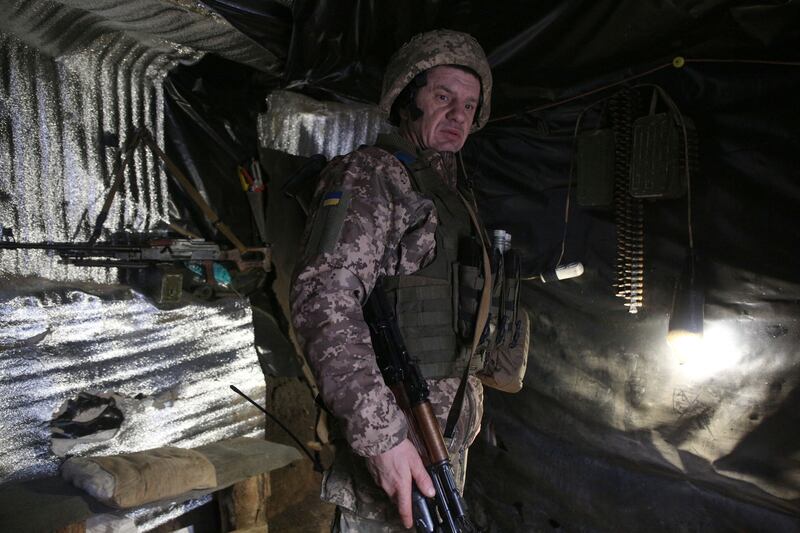 A Ukrainian soldier stationed in the trenches at the front line with Russia-backed separatists near Gorlivka, Donetsk. AFP