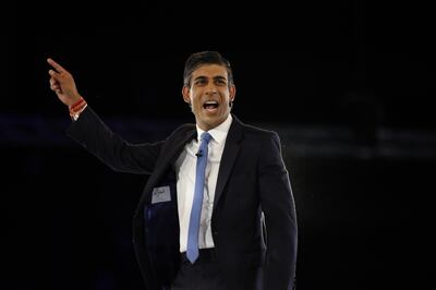 Rishi Sunak addresses the crowd at Wembley Arena. Bloomberg