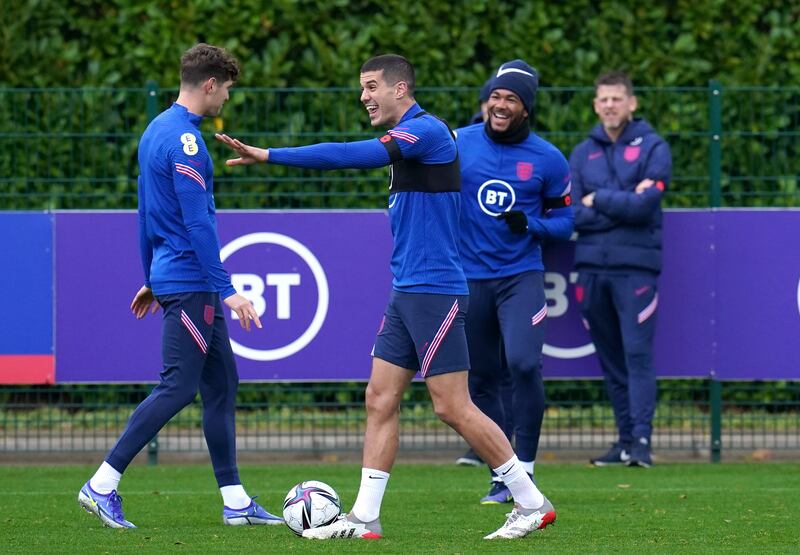 England's John Stones, left, and Conor Coady during training at Hotspur Way Training Ground. PA
