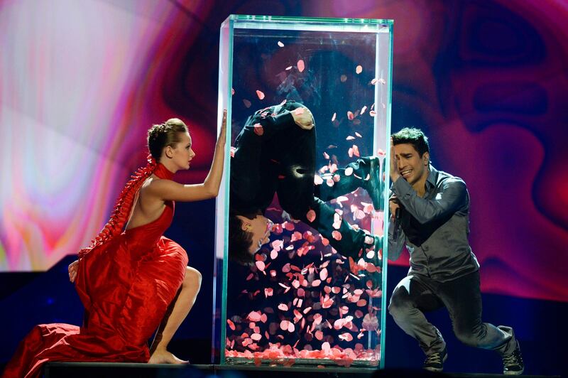 Farid Mammadov (R) of Azerbaijan performs the song "Hold Me” during the final of the 2013 Eurovision Song Contest at the Malmo Opera Hall in Malmo May 18, 2013. REUTERS/Jessica Gow/Scanpix Sweden (SWEDEN - Tags: ENTERTAINMENT) SWEDEN OUT. NO COMMERCIAL OR EDITORIAL SALES IN SWEDEN. ATTENTION EDITORS - THIS IMAGE WAS PROVIDED BY A THIRD PARTY. FOR EDITORIAL USE ONLY. NOT FOR SALE FOR MARKETING OR ADVERTISING CAMPAIGNS. THIS PICTURE IS DISTRIBUTED EXACTLY AS RECEIVED BY REUTERS, AS A SERVICE TO CLIENTS. NO COMMERCIAL SALES *** Local Caption ***  STO102_EUROVISION-S_0518_11.JPG