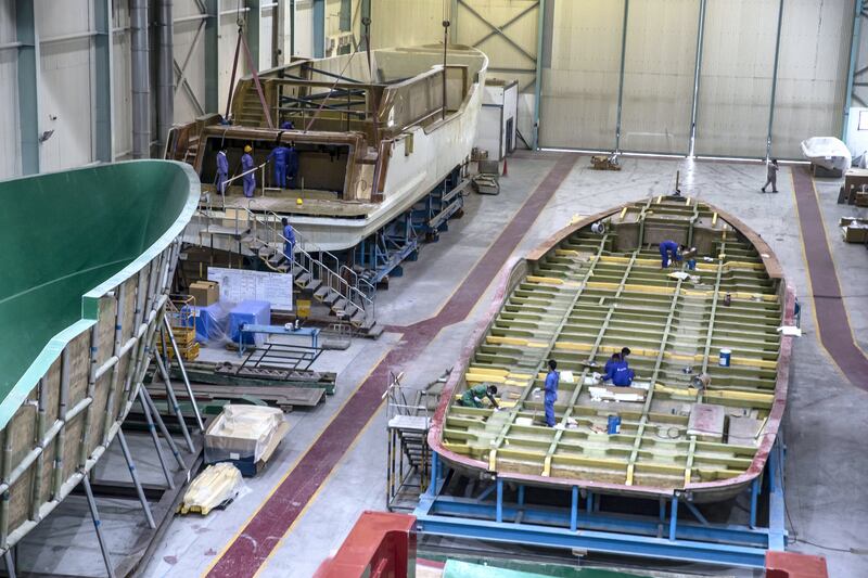 The broad base of one of the larger yachts takes shape. Composite vessels have a shallow draft, making them ideal for beach access.