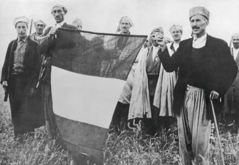 French troops with a recaptured tricolour during the Algerian War of Independence, 1956. (Photo by Keystone/Hulton Archive/Getty Images)