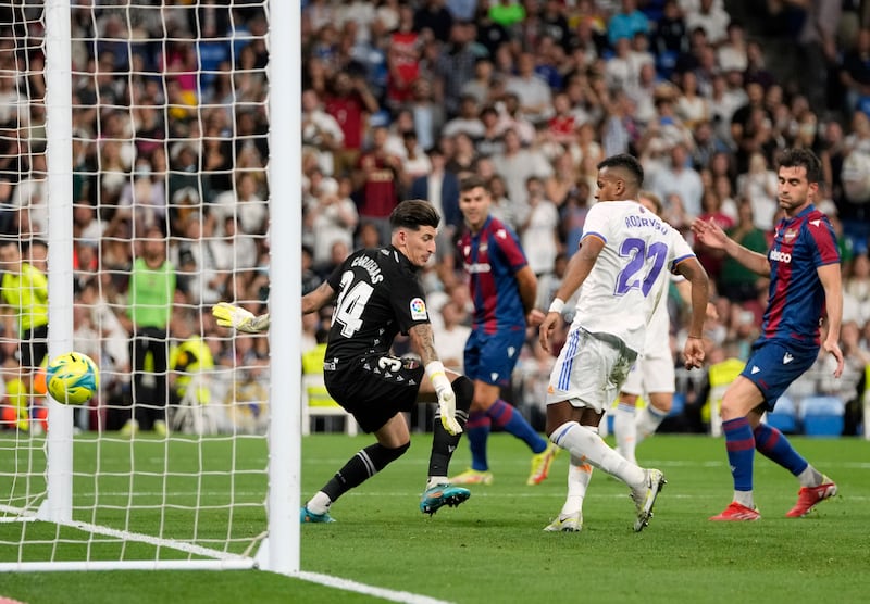 Rodrygo scores the third goal. AP