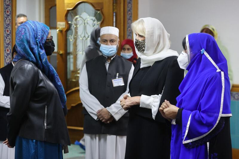 Camilla, Duchess of Cornwall meets members of the community during a visit to learn how the  London Islamic Cultural Society has supported the local community through the coronavirus pandemic, at Wightman Road Mosque in north London. AFP