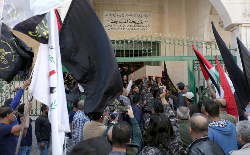 epa07992868 People carry the coffin of Moaz, the son of Akram al-Ajouri, a leader of the Islamic Jihad Movement, during funeral procession at al-Majed Mosque in Damascus, Syria, 13 November 2019. Reports state Moaz was killed along with another person a day earlier by Israeli missiles that hit his house in Mezza area in Damascus. Al-Ajouri survived the attack.  EPA/YOUSSEF BADAWI