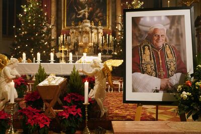 A portrait of Pope Benedict XVI at a commemorative mass at in Altotting, Bavaria, southern Germany. The former pope had strong ties to the area. Getty Images