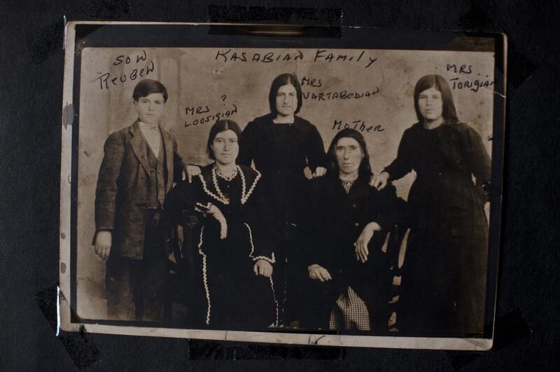 After being scattered across the globe by the 1915 Armenian Genocide and the pogroms that preceded it, family members attempted to keep in touch with relatives in Syria, France, Lebanon,and the United States through photographs and postcards. Courtesy Scout Tufankjian