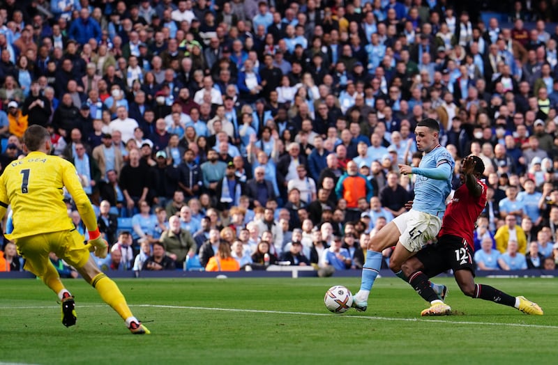 Phil Foden scores City's fourth goal. PA
