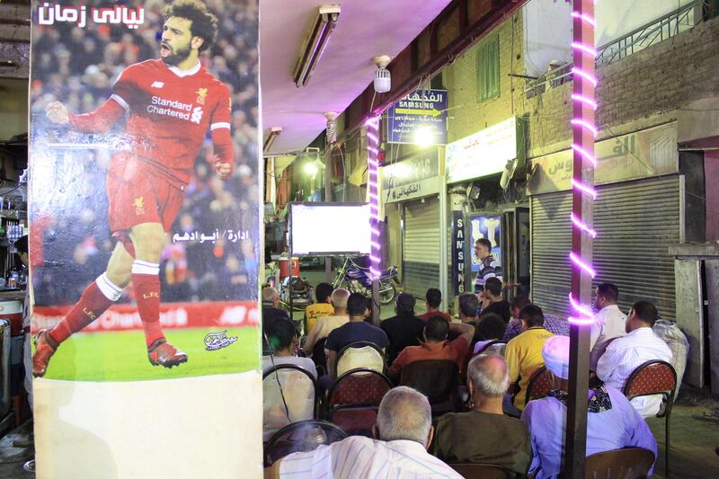 Liverpool fans celebrate in Cairo. Adham Youssef