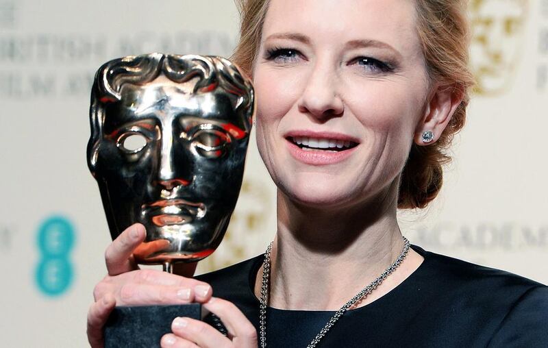 Cate Blanchett poses in the press room after winning the Best Leading Actress award for her performance in Blue Jasmine. Andy Rain / EPA