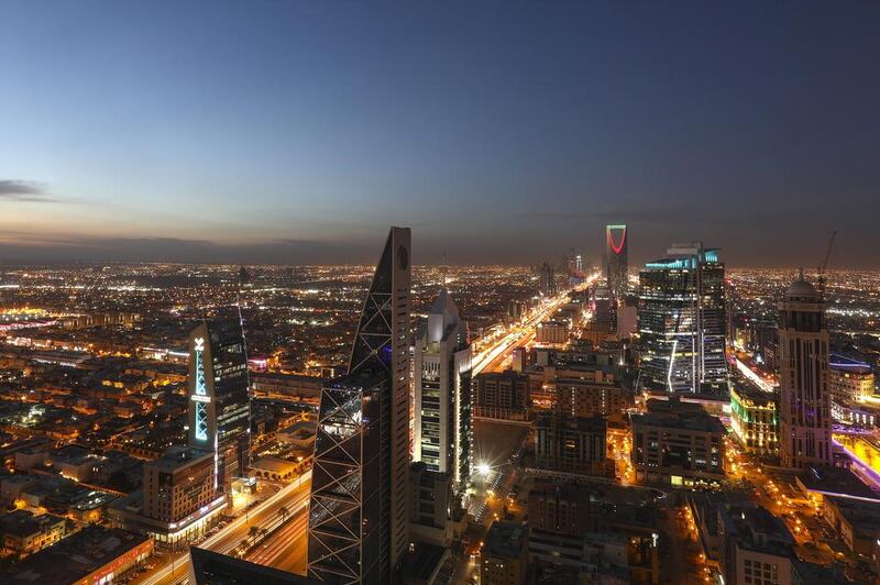 Wage increases, fuel subsidy cuts and the introduction of VAT in Saudi Arabia is evident in the higher input costs and staff costs components, said Khatija Haque, head of MENA research at Emirates NBD. Simon Dawson / Bloomberg.