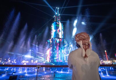 Abu Dhabi, United Arab Emirates, November 23, 2020.   Sheikh Zayed Heritage Festival celebrations at Al Wathba.  Visitors enjoy the lights and sound fountain display.
Victor Besa/The National
Reporter:  Samia Badih
Section:  NA
For:  Standalone/Stock