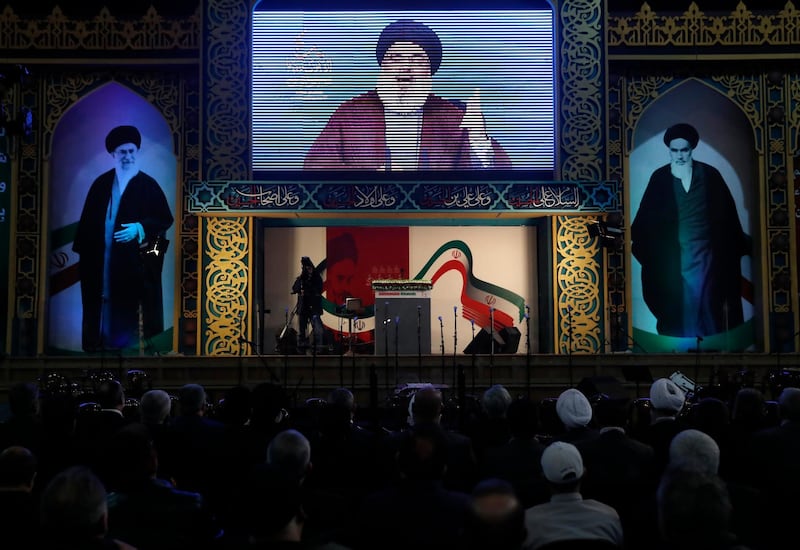 Hezbollah leader Sayyed Hassan Nasrallah delivers a live broadcast speech, during a rally to commemorate the 40th anniversary of Iran's Islamic Revolution, in southern Beirut, Lebanon, Wednesday, Feb. 6, 2019. Nasrallah says Iran won't be fighting alone in the event that United States launches launch a war against it. He says the Islamic Republic is the strongest state in the region, and the so-called axis of resistance led by Iran is the strongest it has ever been. (AP Photo/Hussein Malla)
