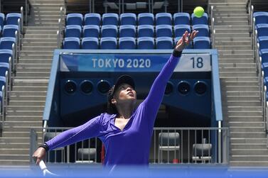 Japan's Naomi Osaka attends a training session at the Ariake Tennis Park ahead of the start of the Tokyo 2020 Olympic Games in Tokyo on July 20, 2021.  (Photo by Tiziana FABI  /  AFP)
