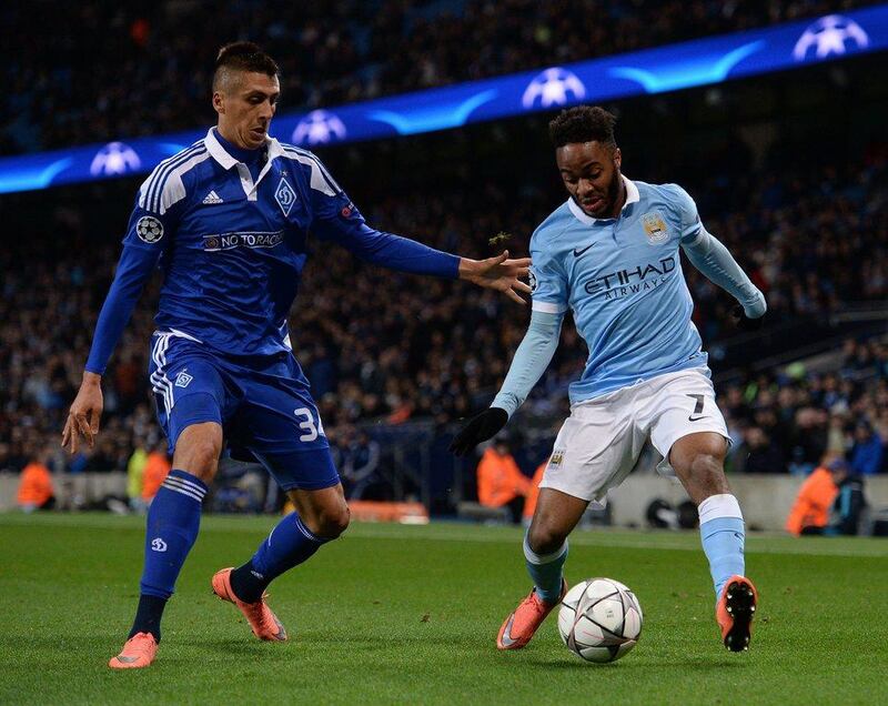 Dynamo Kiev’s Ukrainian defender Yevhen Khacheridi (L) vies with Manchester City’s English midfielder Raheem Sterling during a Uefa Champions League last 16, second leg football match between Manchester City and Dynamo Kiev at the Etihad Stadium in Manchester, north west England, on March 15, 2016. The match ended in a draw. AFP / OLI SCARFF