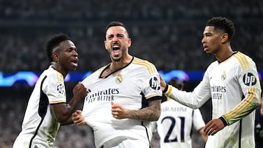 MADRID, SPAIN - MAY 08: Joselu of Real Madrid celebrates scoring his team's first goal with Vinicius Junior and Jude Bellingham during the UEFA Champions League semi-final second leg match between Real Madrid and FC Bayern München at Estadio Santiago Bernabeu on May 08, 2024 in Madrid, Spain. (Photo by David Ramos / Getty Images)