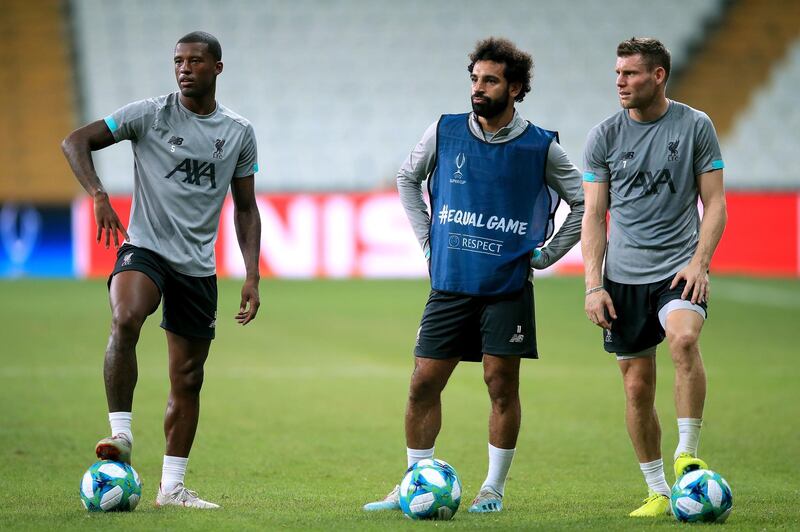 Liverpool's Georginio Wijnaldum (left to right), Mohamed Salah and James Milner during the training session at Besiktas Park, Istanbul. PA Wire