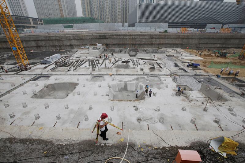 Labourers work at a construction site in Beijing, China July 20, 2017. Picture taken July 20, 2017. REUTERS/Jason Lee