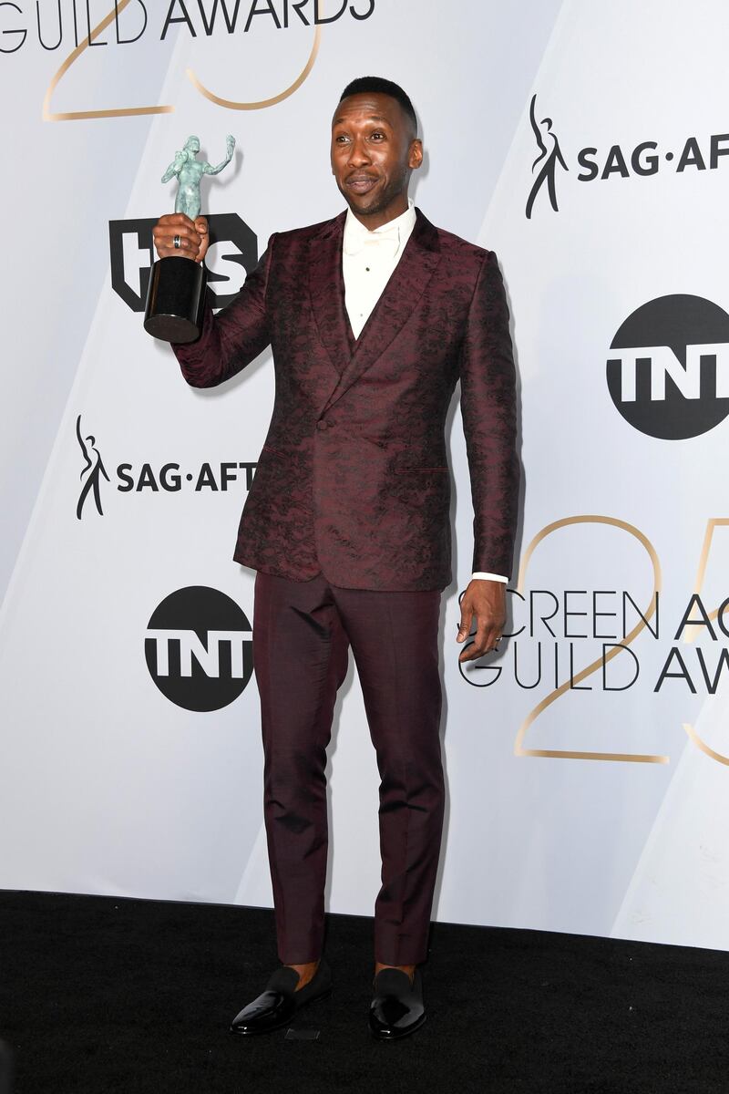 LOS ANGELES, CA - JANUARY 27: Mahershala Ali, winner of Outstanding Performance by a Male Actor in a Supporting Role for 'Green Book,' poses in the press room during the 25th Annual Screen Actors Guild Awards at The Shrine Auditorium on January 27, 2019 in Los Angeles, California.   Frazer Harrison/Getty Images/AFP