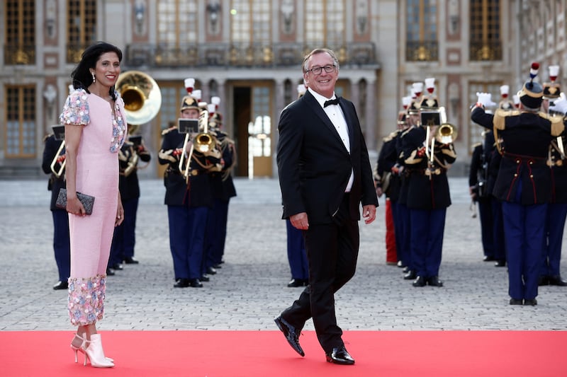 Leena Nair, chief executive of Chanel, and Bruno Pavlovsky, president of fashion at the company, arrive for the dinner. Reuters