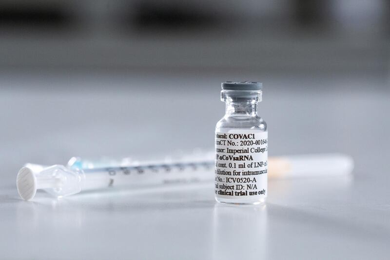 A vial with potential vaccine for the coronavirus disease (COVID-19) is pictured at the Imperial College London, London, Britain June 10, 2020, Picture taken June 10, 2020. Imperial College London/Thomas Angus/via REUTERS THIS IMAGE HAS BEEN SUPPLIED BY A THIRD PARTY. MANDATORY CREDIT. NO RESALES. NO ARCHIVES.