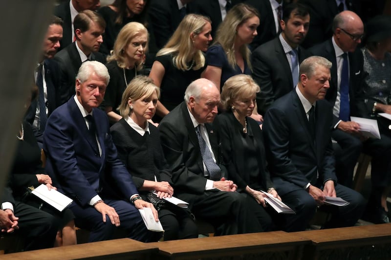 Former US President Bill Clinton, former Secretary of State Hillary Clinton, former US Vice President Dick Cheney, Lynne Cheney, and former US Vice President Al Gore sit for the funeral service.  Getty Images/AFP